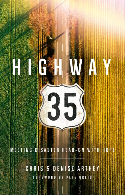 Cover photo of Highway 35 book. Photo of a small two lane road, from directly abouve. Two fields on either side of the road. Left green, right a yellow field.